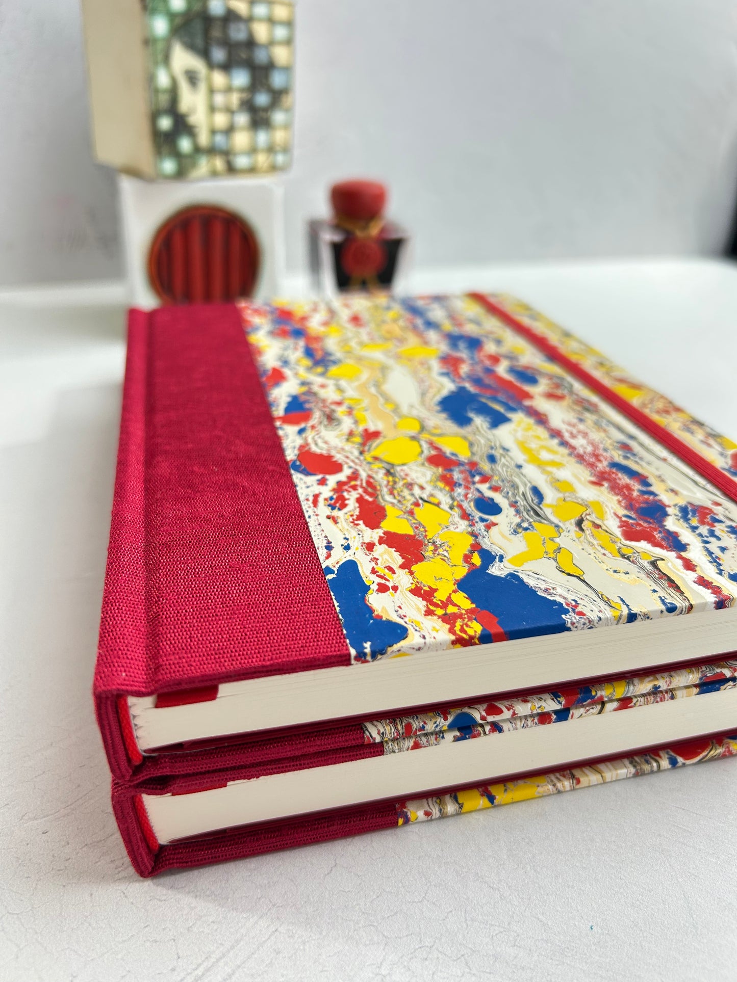 B5 192-page Hardcover Journal finished in Cardinal Red Japanese book cloth and Italian hand-marbled paper by Renato Crepaldi