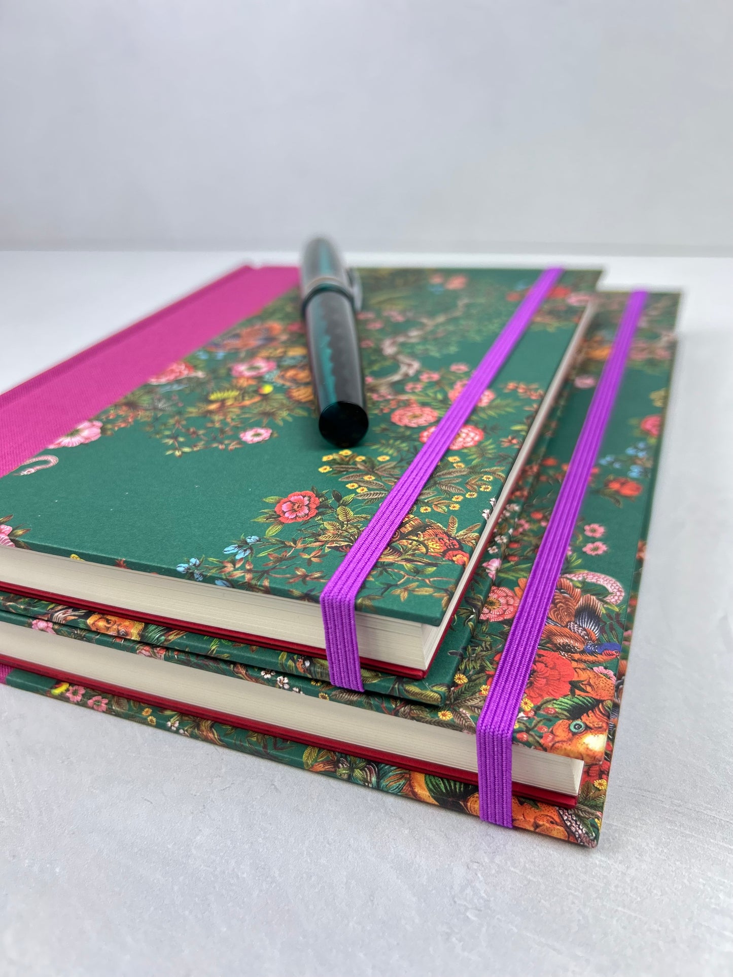 B5 192-page Hardcover Journal finished in Berry Bloom Verona book cloth and Oasis Print by Phannapast Taychamaythakool