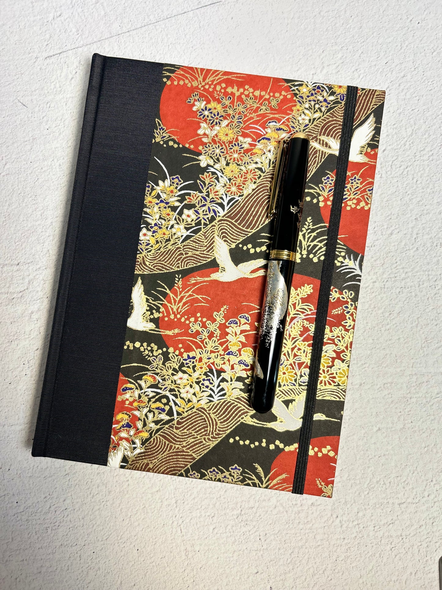 A5 Hardcover Notebook finished in Hardcover Notebook finished in Black Japanese Book cloth and Bronze and Gold Chiyogami Paper