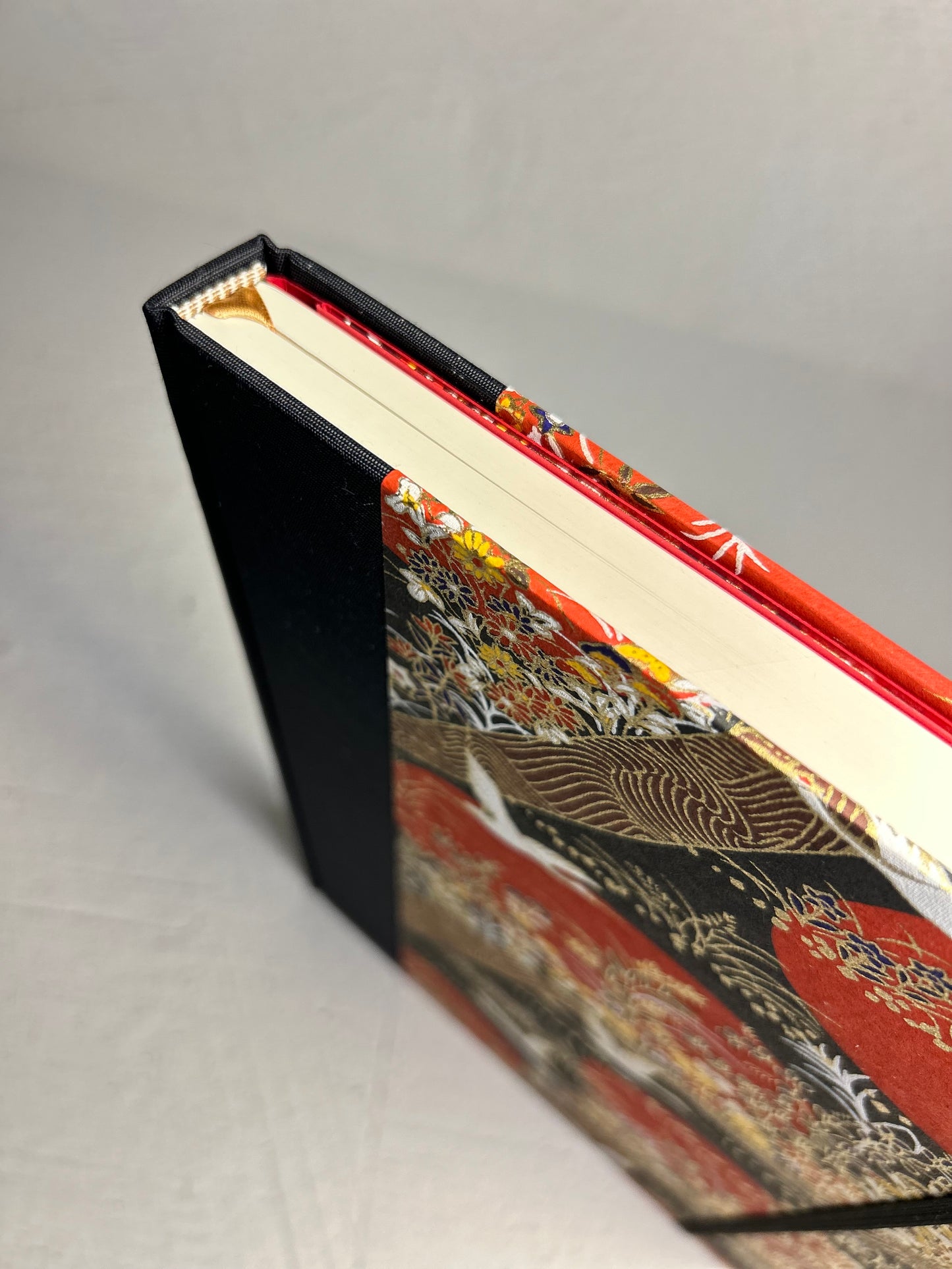 B5 Hardcover Notebook finished in Black Japanese Book cloth and Bronze and Gold Chiyogami Paper