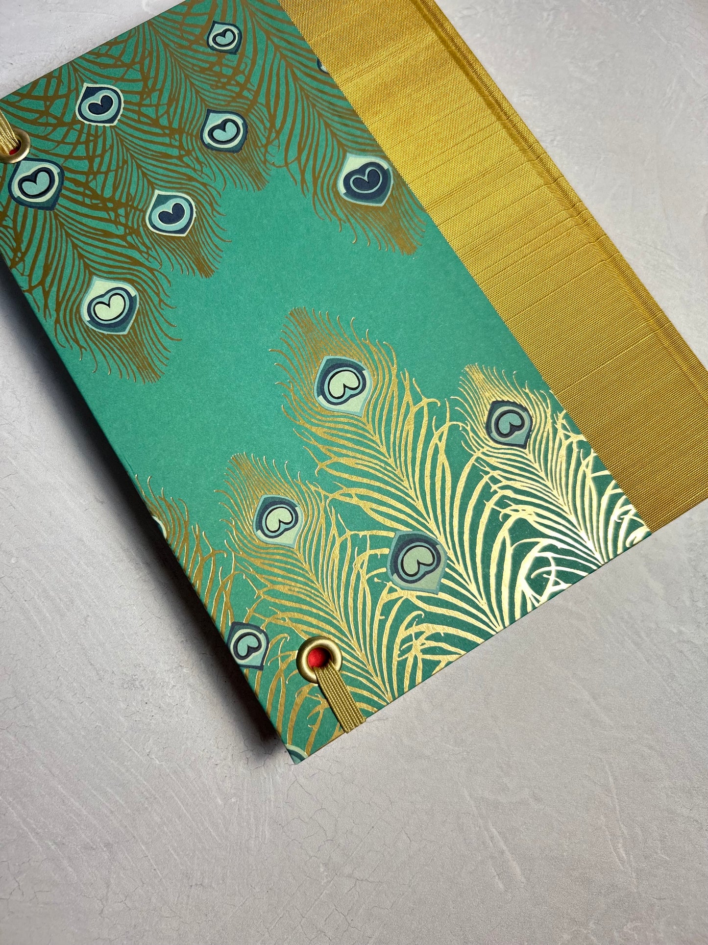 A5 Hardcover Notebook finished in Yellow Gold Japanese Book cloth and Matthew Williamson Peacock print