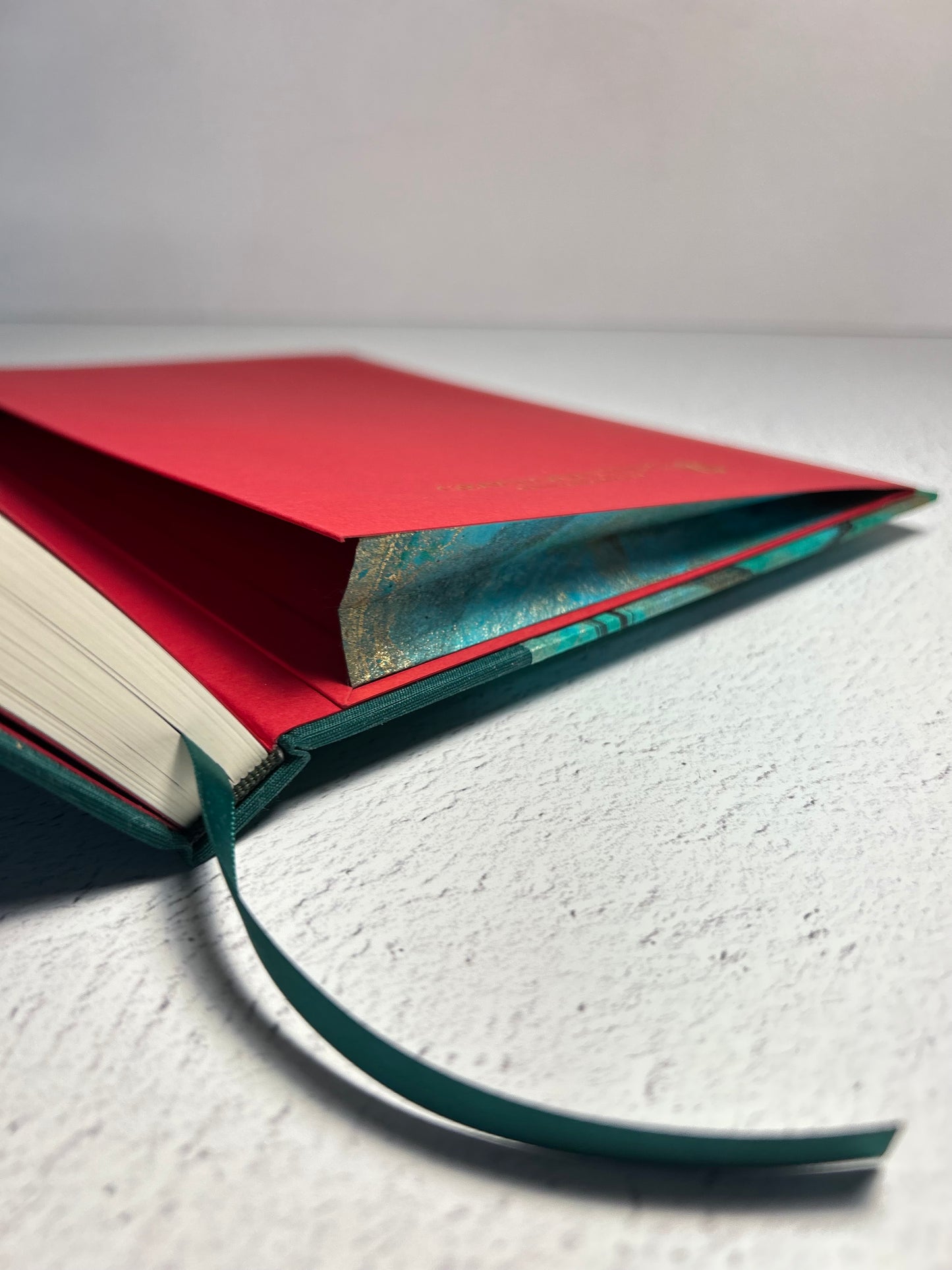 A5 Hardcover Notebook finished in Mohair Green Japanese Bookcloth and Hand Marbled Thai Momi Paper