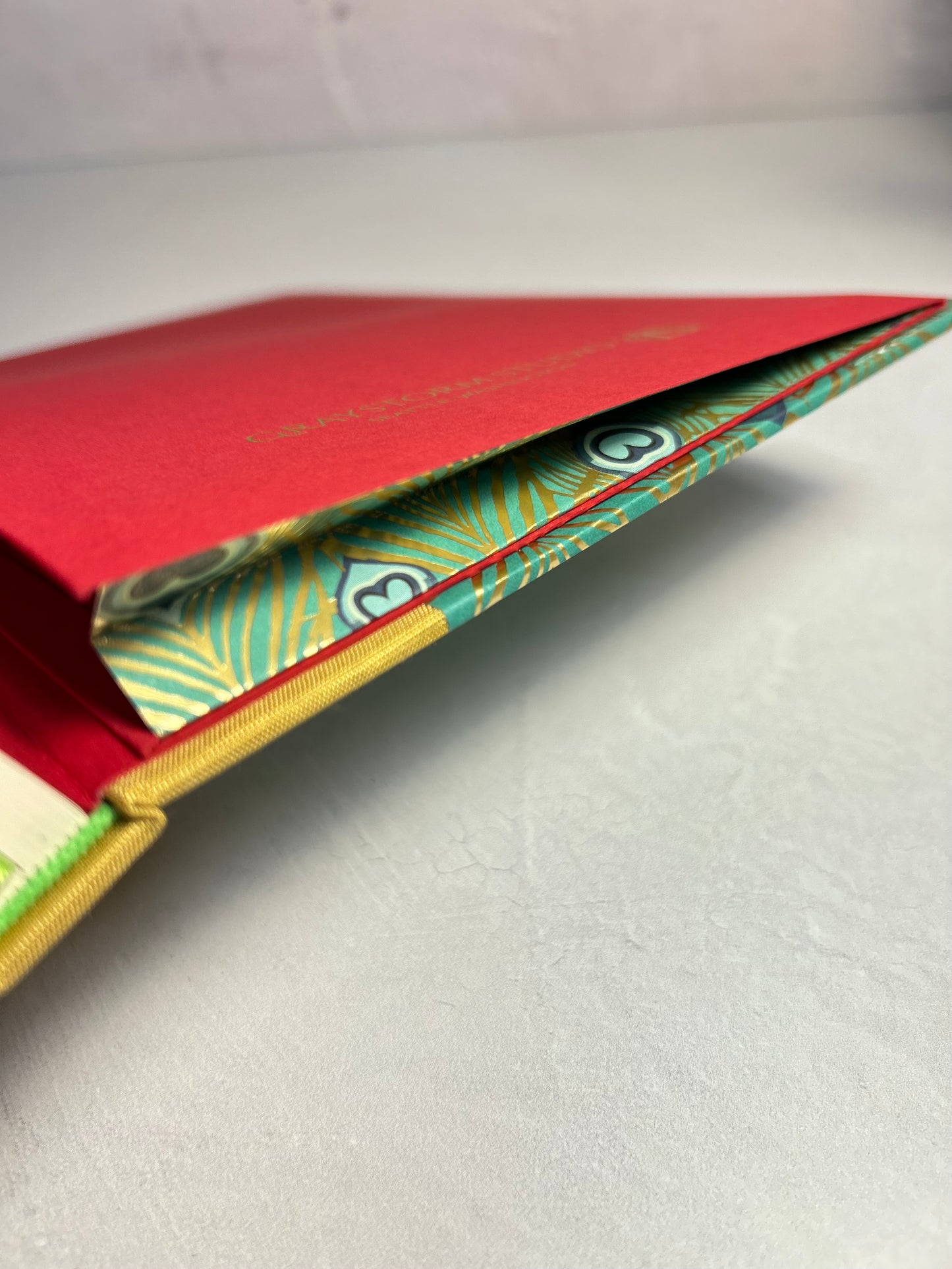 A5 Hardcover Notebook finished in Yellow Gold Japanese Book cloth and Matthew Williamson Peacock print