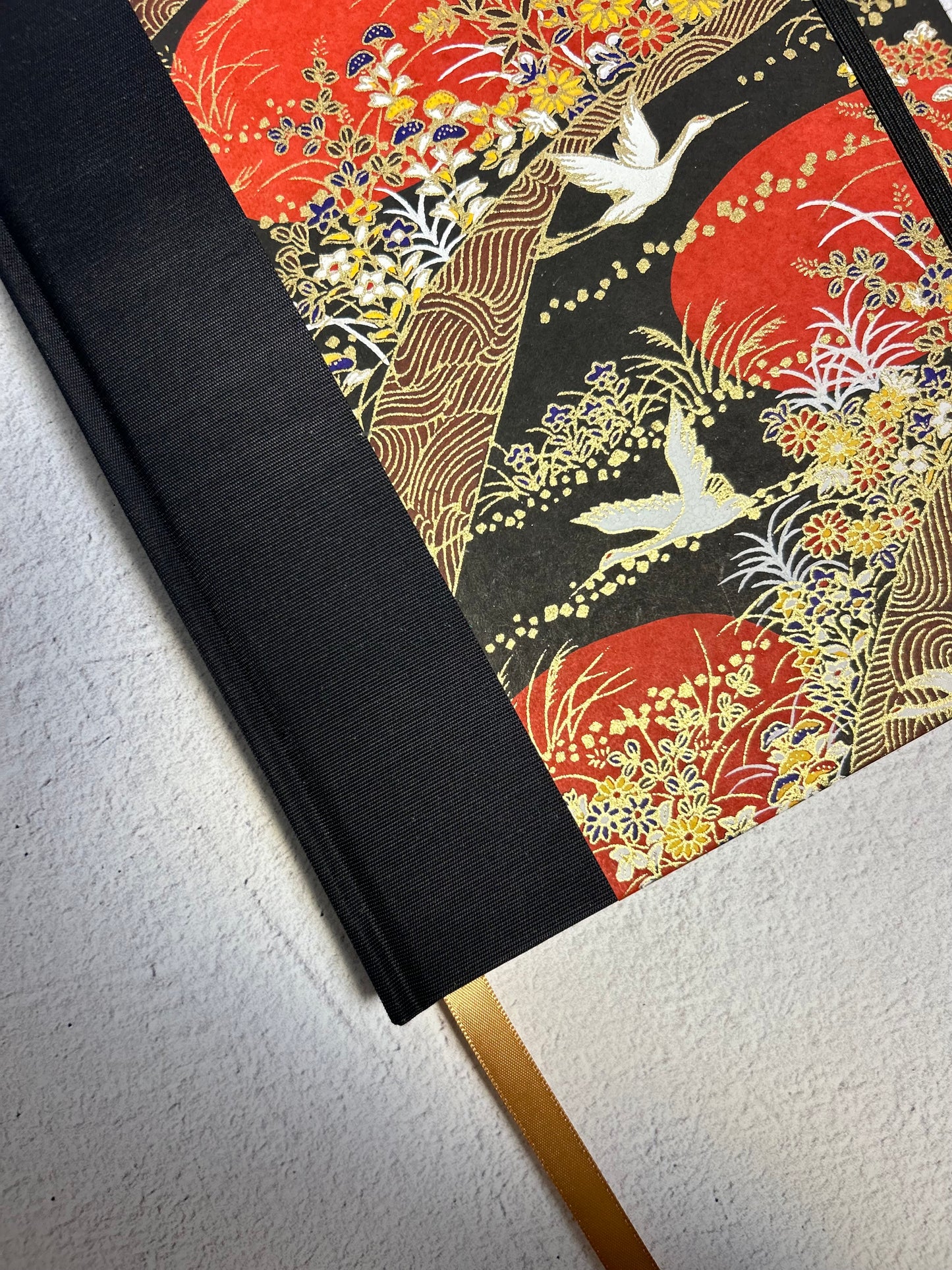 B5 Hardcover Notebook finished in Black Japanese Book cloth and Bronze and Gold Chiyogami Paper
