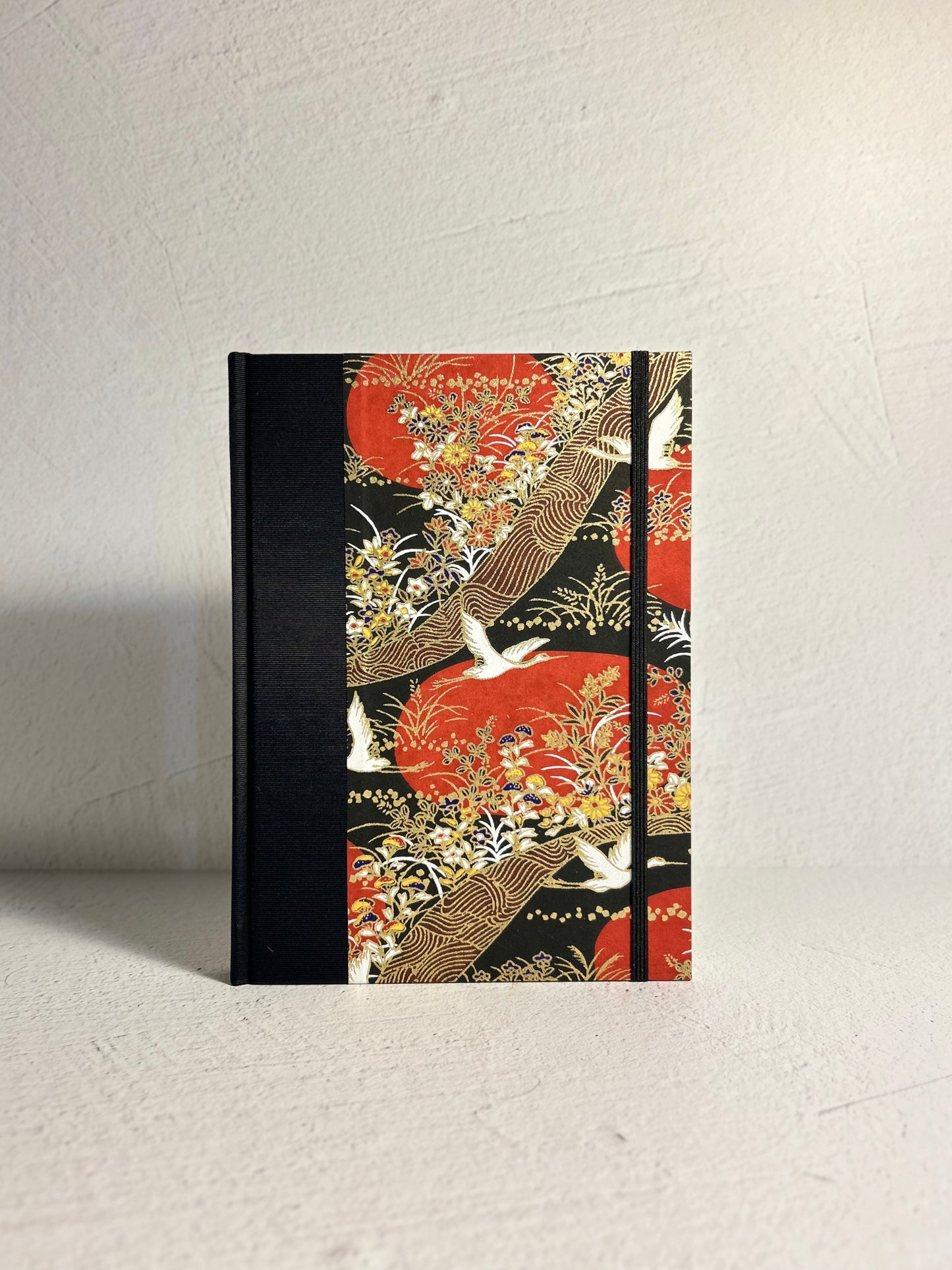 A5 Hardcover Notebook finished in Hardcover Notebook finished in Black Japanese Book cloth and Bronze and Gold Chiyogami Paper