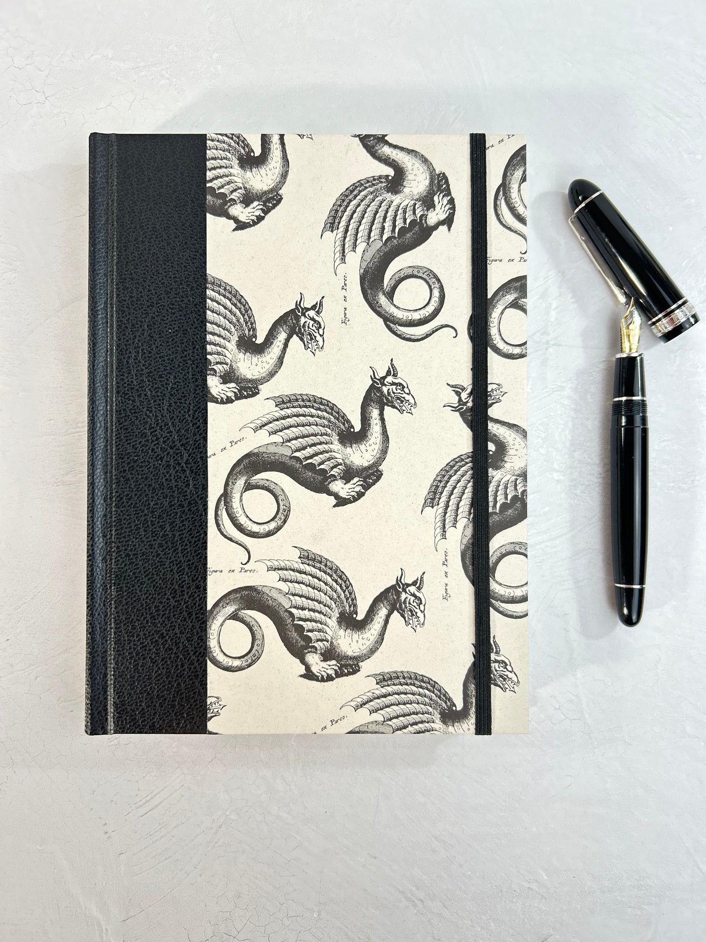 A5 160-page Hardcover Journal finished in Black Vaux Leather and Italian Letterpress dragon design