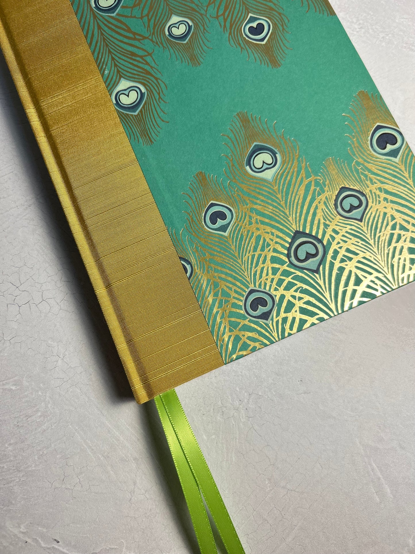 A5 Hardcover Notebook finished in Yellow Gold Japanese Book cloth and Matthew Williamson Peacock print