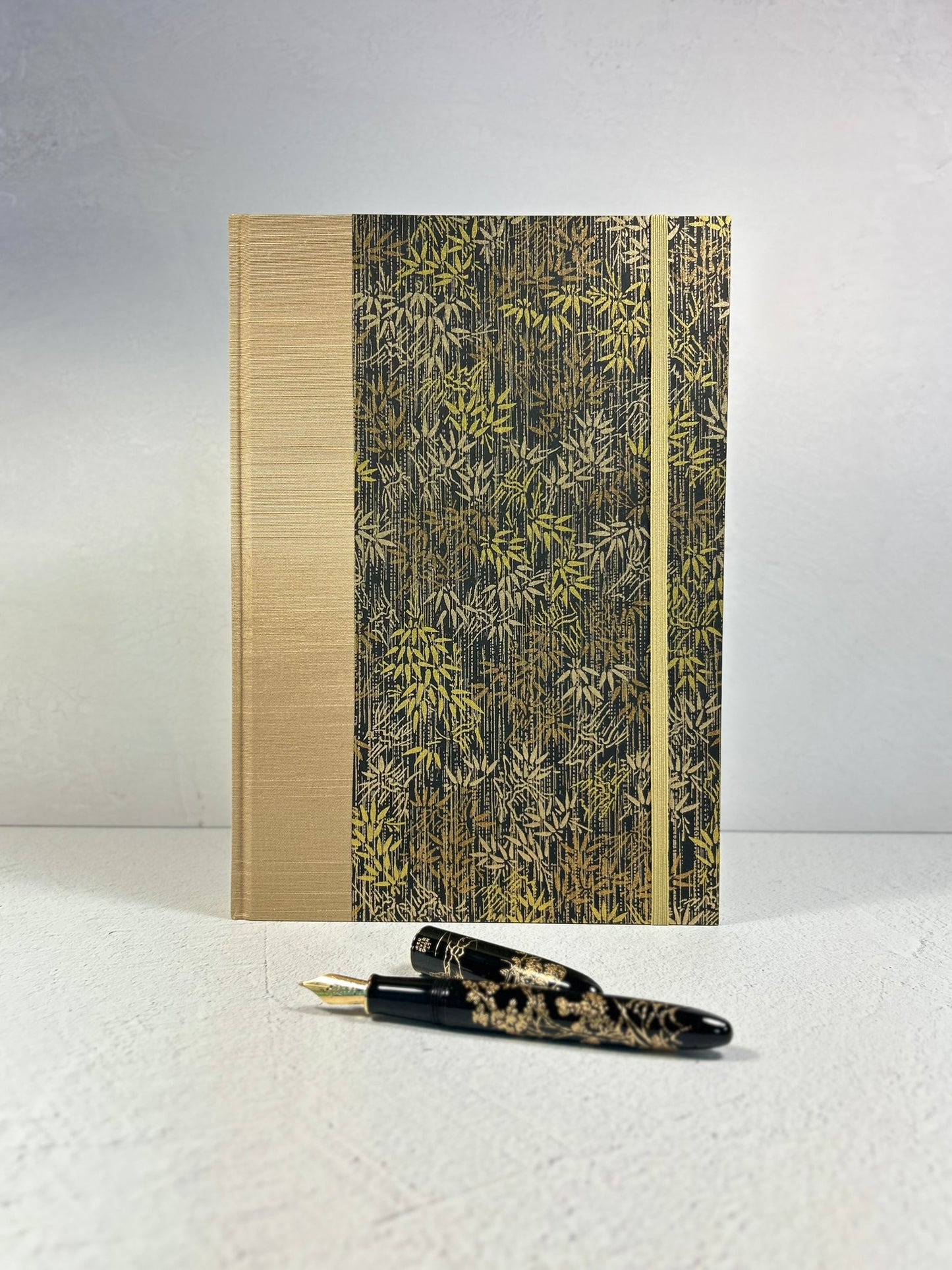 B5 Hardcover Notebook finished in soft gold Japanese Bookcloth and gold/bronze bamboo on black Chiyogami Paper