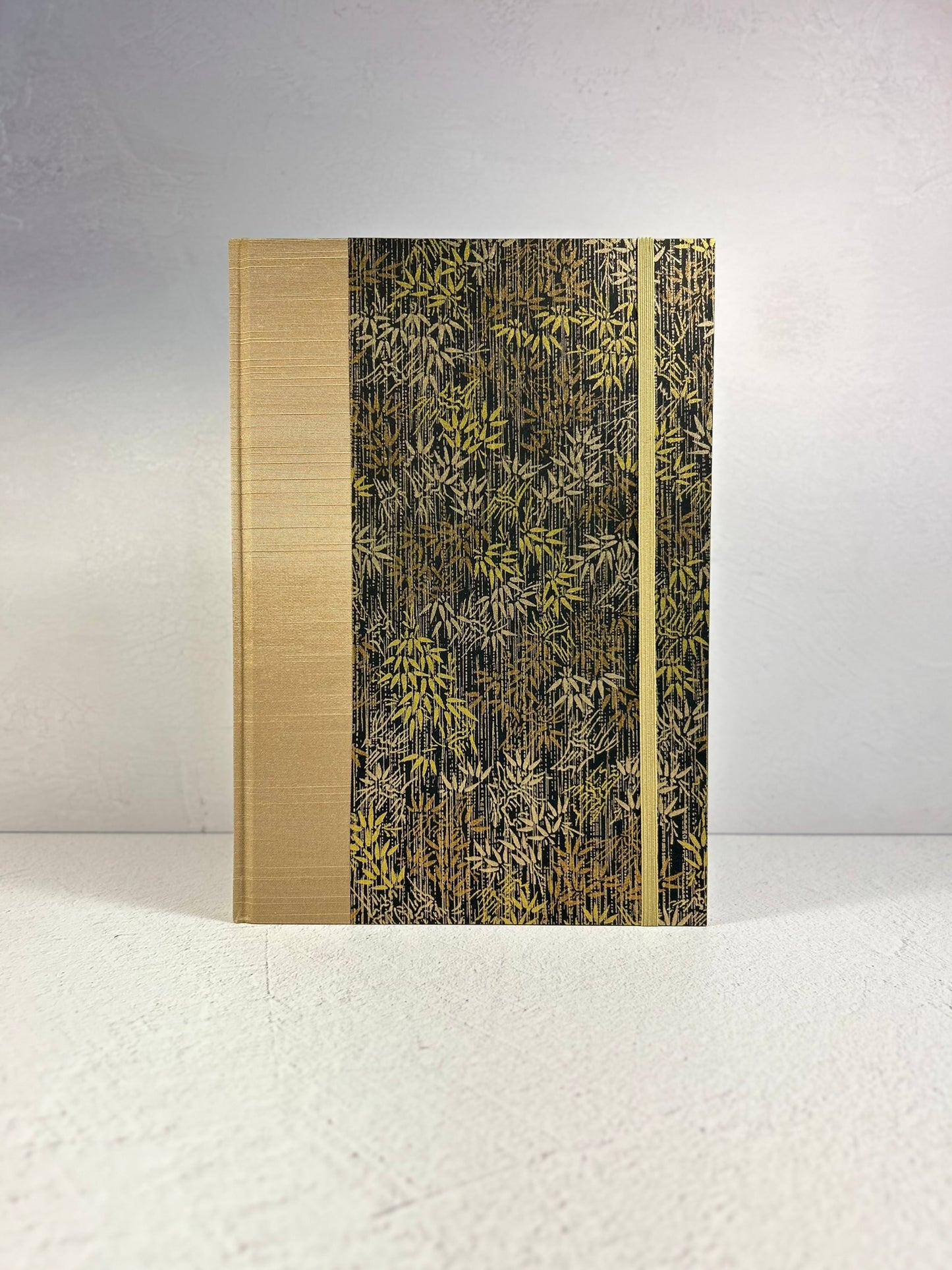 B5 Hardcover Notebook finished in soft gold Japanese Bookcloth and gold/bronze bamboo on black Chiyogami Paper