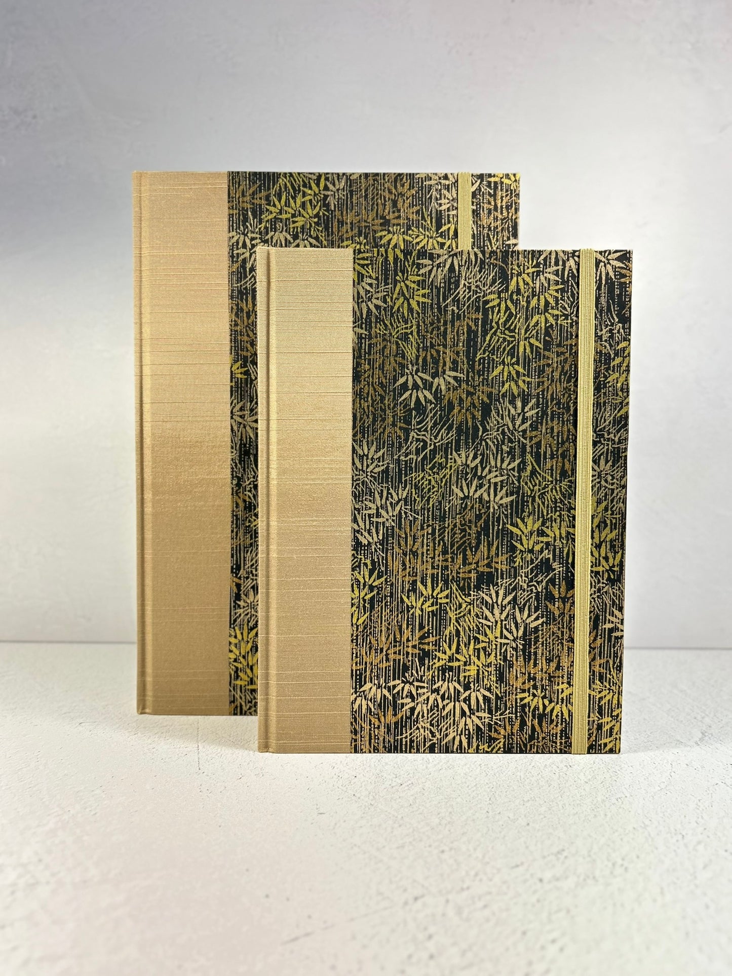 A5 Hardcover Notebook finished in soft gold Japanese Bookcloth and gold/bronze bamboo on black Chiyogami Paper