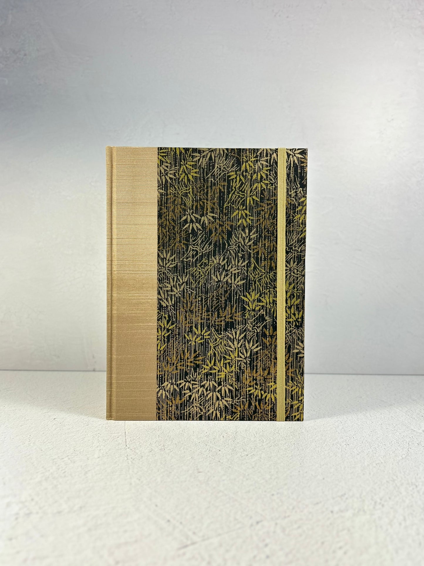 A5 Hardcover Notebook finished in soft gold Japanese Bookcloth and gold/bronze bamboo on black Chiyogami Paper