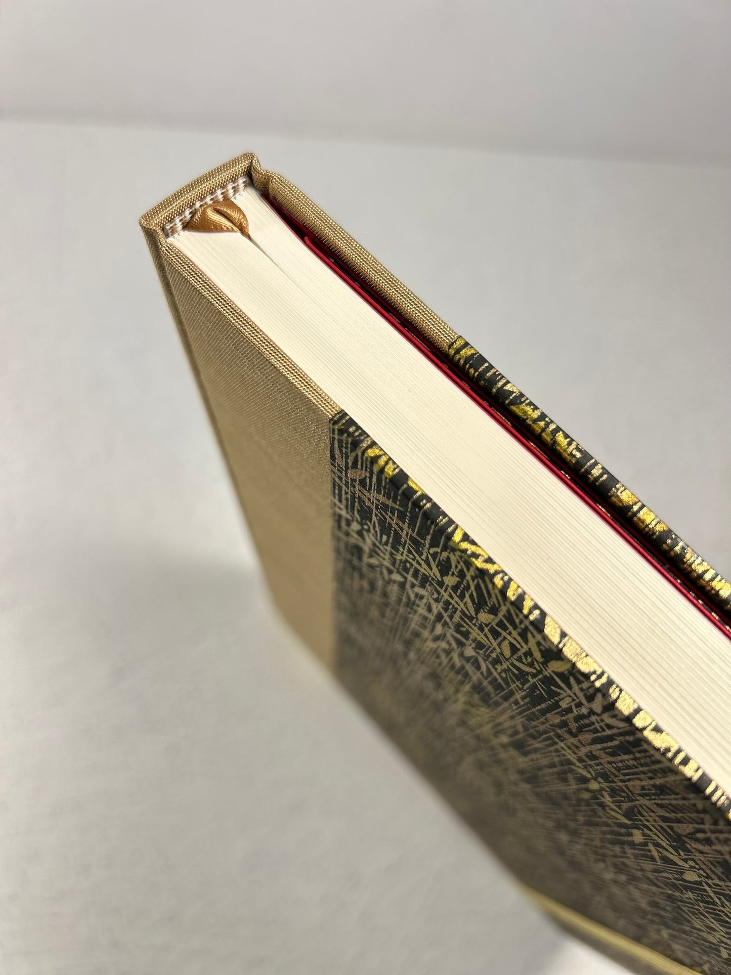 A5 Hardcover Notebook finished in soft gold Japanese Bookcloth and gold/bronze bamboo on black Chiyogami Paper