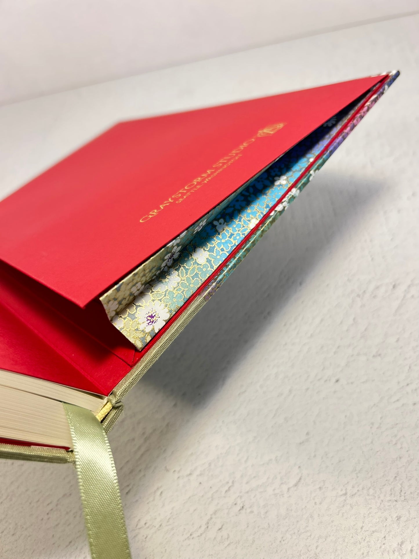 A5 Hardcover Notebook finished in Celery Green Japanese Bookcloth and Rainbow Flowers Chiyogami Paper