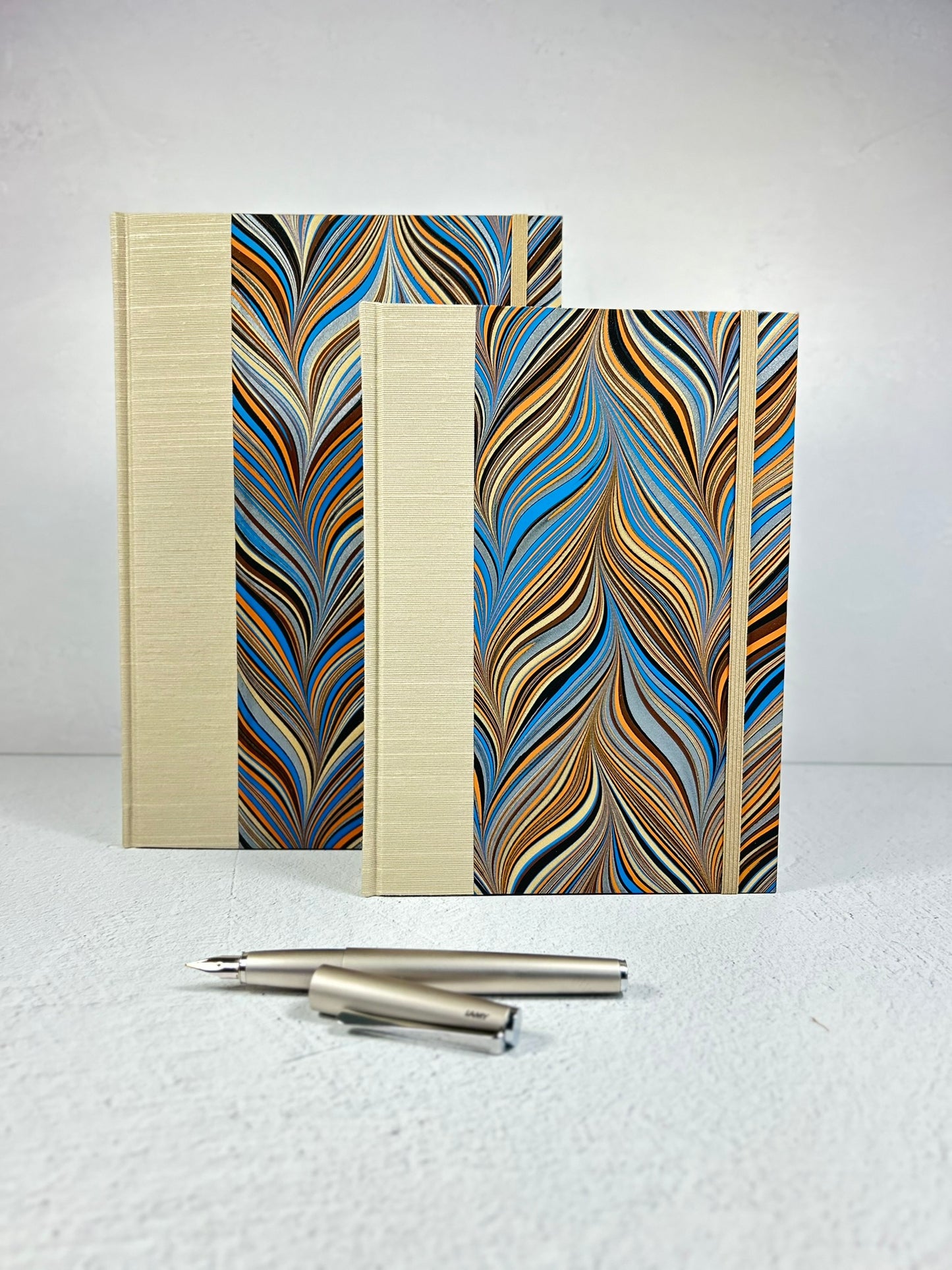 B5 Hardcover Notebook finished in Platinum Japanese book cloth and featuring Renato Crepaldi hand-marbled decorative paper