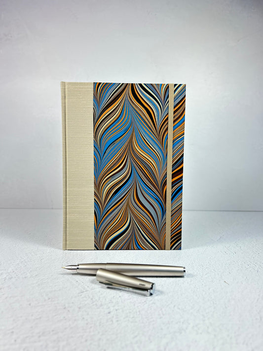 A5 Hardcover Notebook finished in Platinum Japanese book cloth and featuring Renato Crepaldi hand-marbled decorative paper