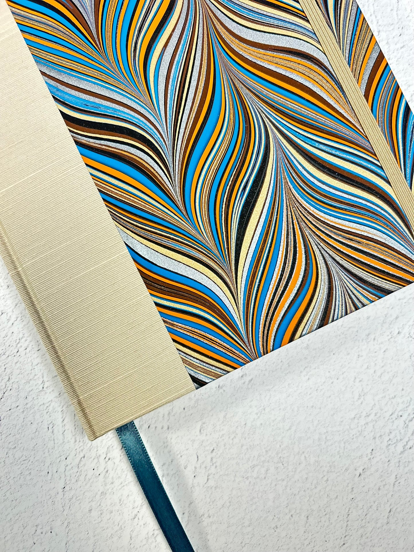 B5 Hardcover Notebook finished in Platinum Japanese book cloth and featuring Renato Crepaldi hand-marbled decorative paper