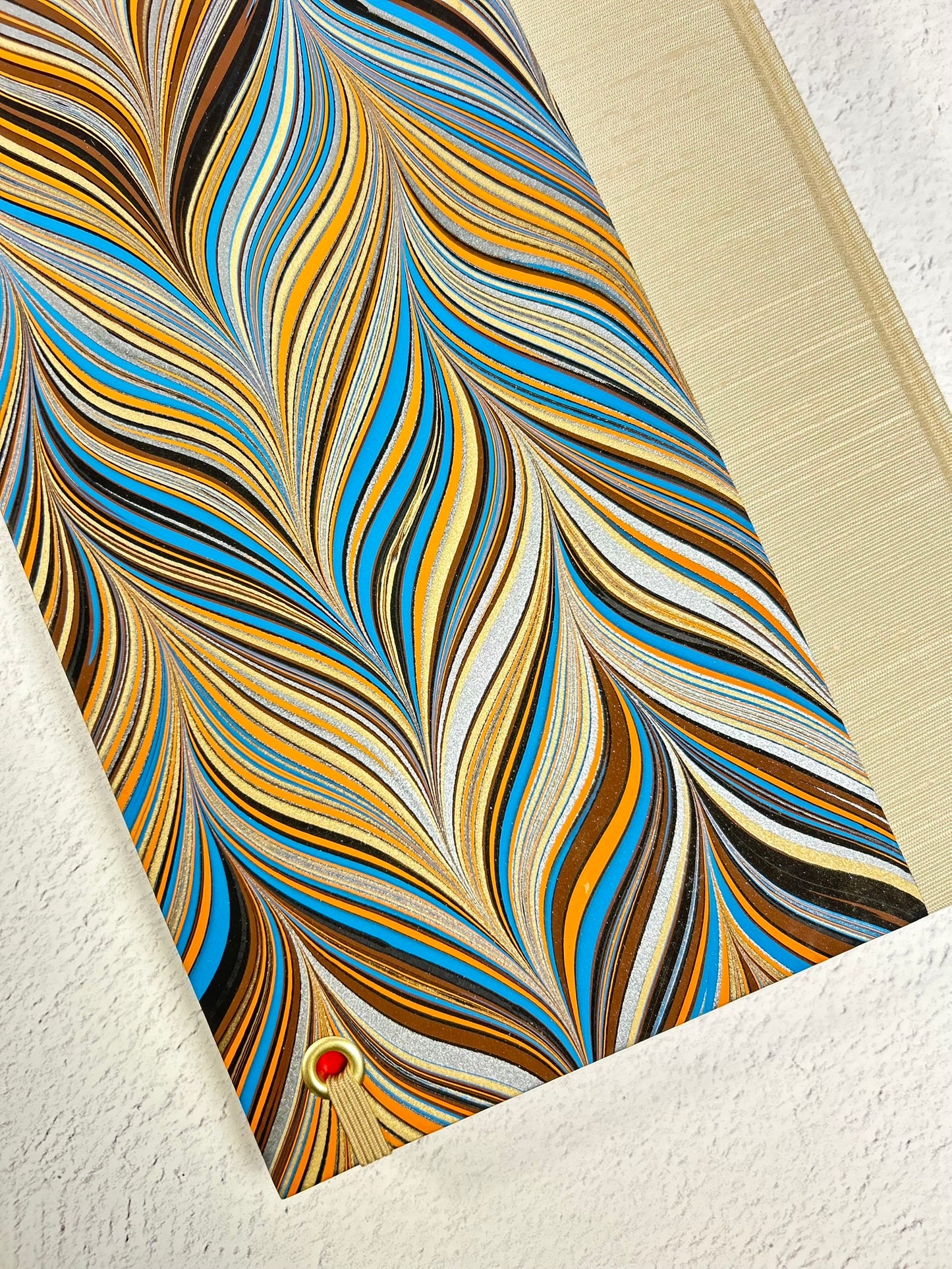 B5 Hardcover Notebook finished in Platinum Japanese book cloth and featuring Renato Crepaldi hand-marbled decorative paper