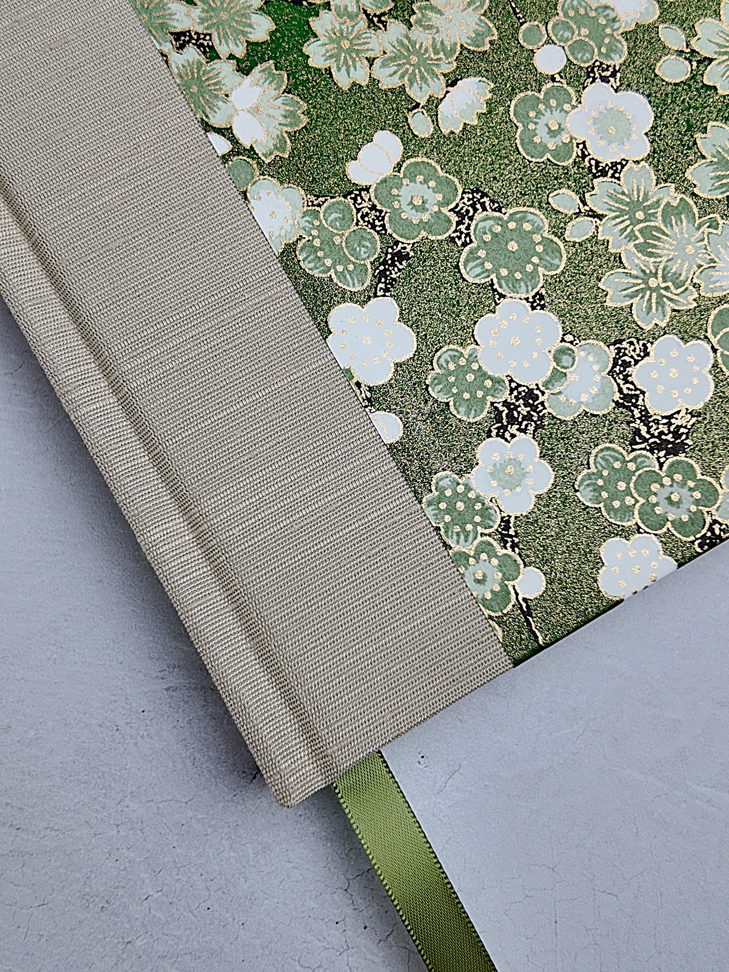 A5 160-page Hardcover Journal finished in Platinum Japanese book cloth and green Cherry Blossom Chiyogami Paper