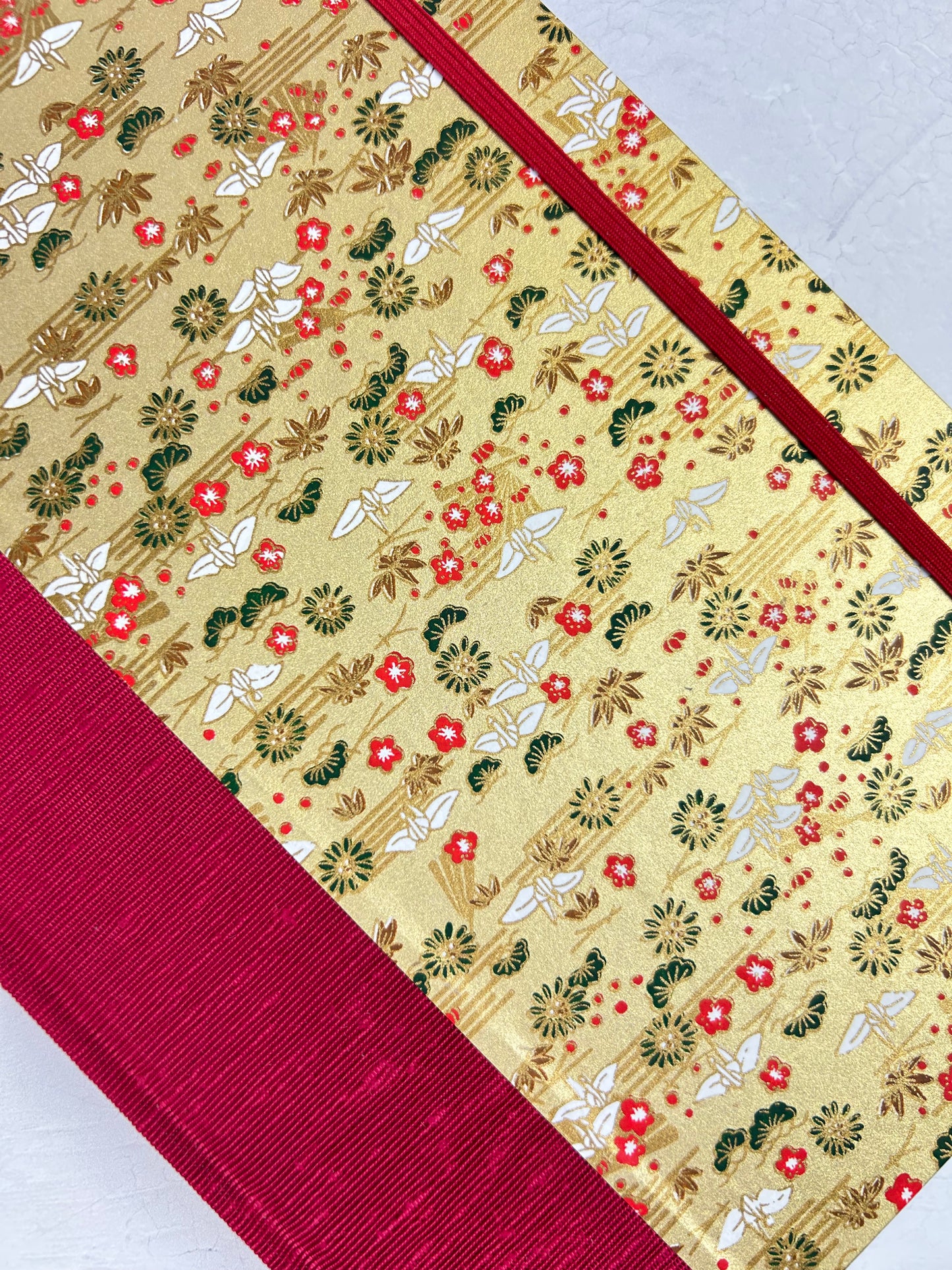 A5 160-page Hardcover Journal finished in Cardinal Red Japanese book cloth and White Cranes on Gold Chiyogami Paper
