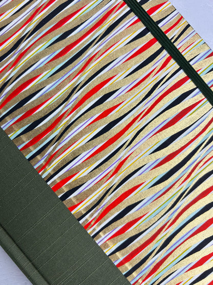 A5 160-page Hardcover Journal finished in olive green Japanese book cloth and gold, black and red geometric Chiyogami Paper