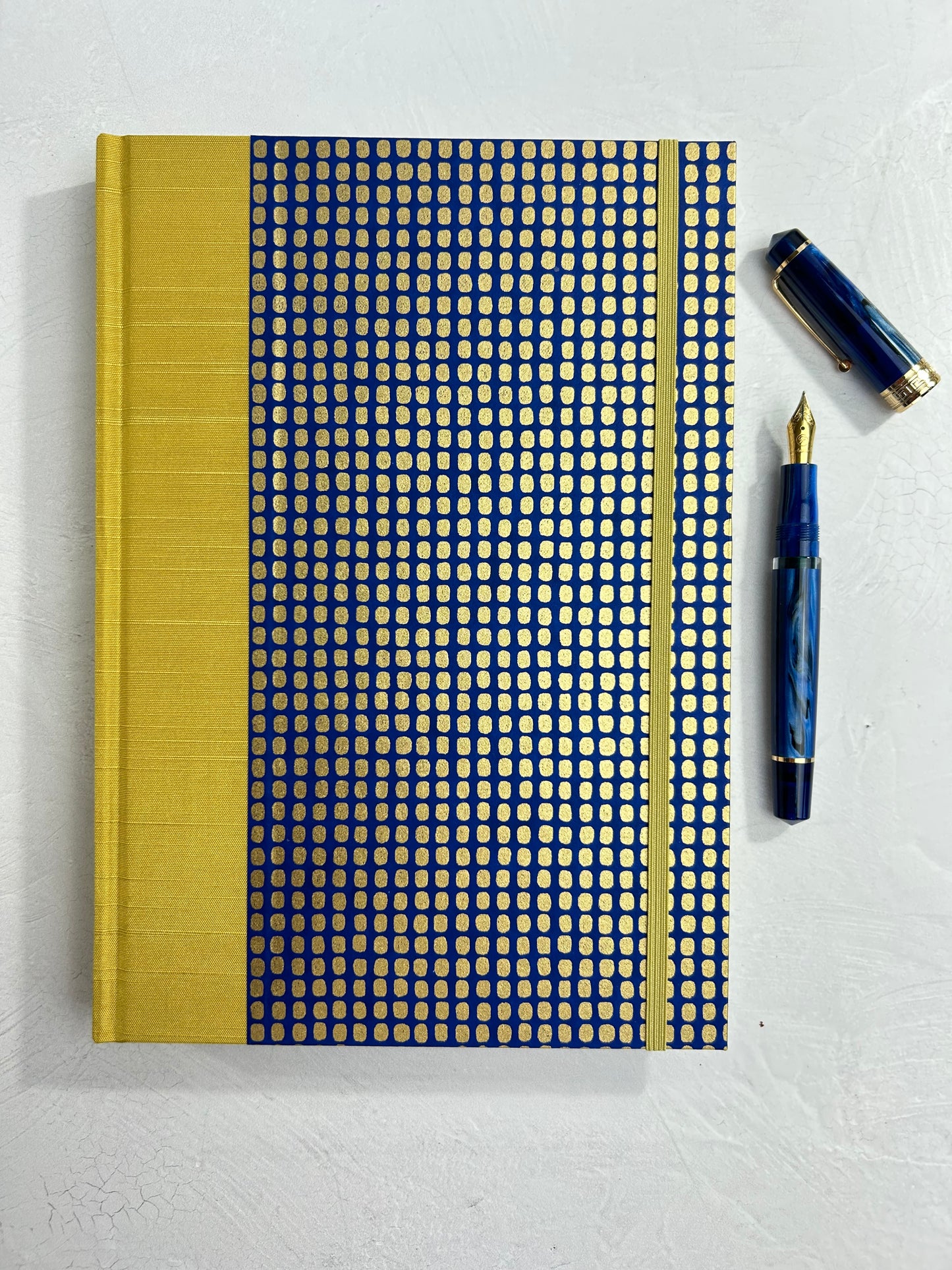 B5 192-page Hardcover Journal finished in Yellow Gold Japanese book cloth and blue and gold Chiyogami Paper