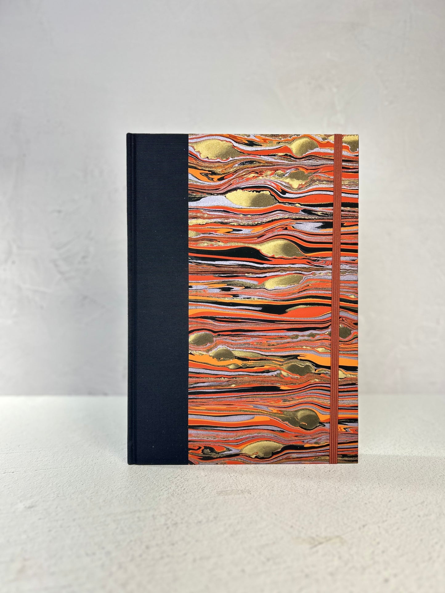 B5 Hardcover Notebook finished in Black Japanese book cloth and Renato Crepaldi hand marbled paper