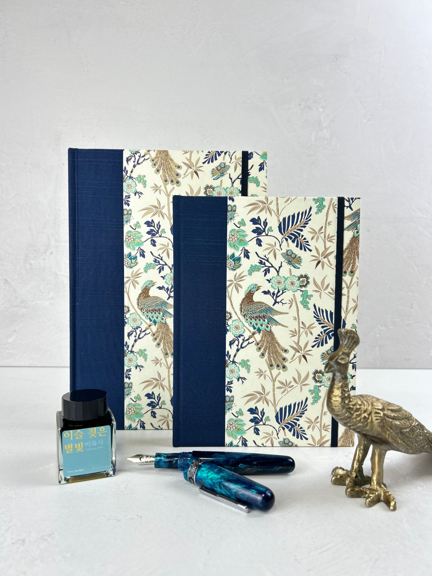 B5 Hardcover Notebook finished in Cadette Blue Japanese book cloth and Gold Peacock Italian Print