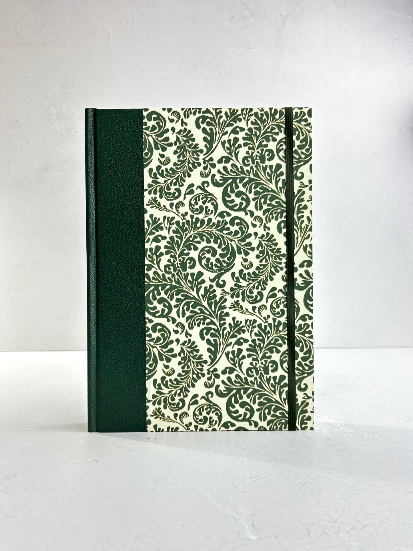 B5 192-page Hardcover Journal finished in Green Vaux Leather and green and gold fern Italian Florentine print