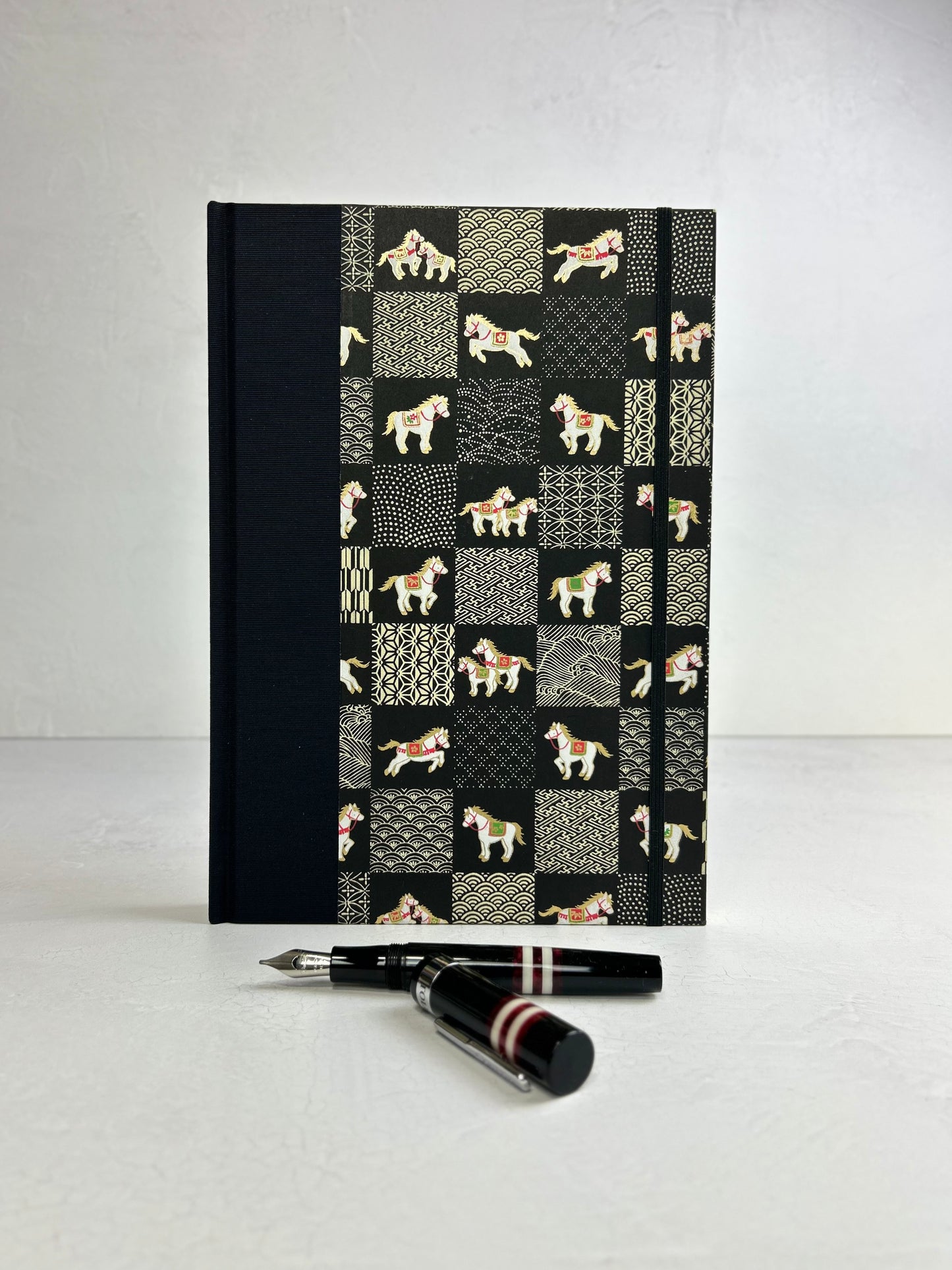 B5 192-page Hardcover Journal finished in Black Japanese book cloth and White Horse Chiyogami Paper