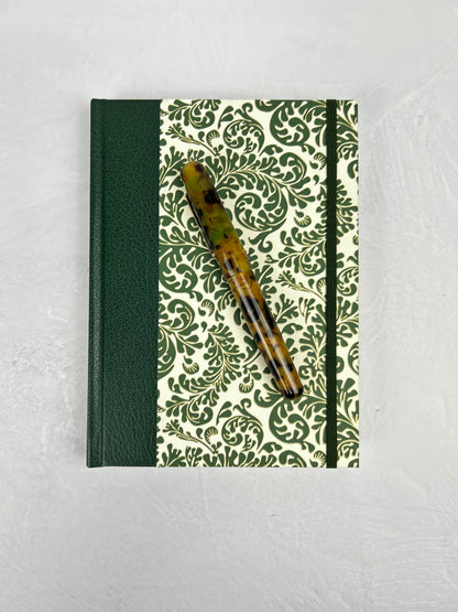 A5 160-page Hardcover Journal finished in Green Vaux Leather and green and gold fern Italian Florentine print