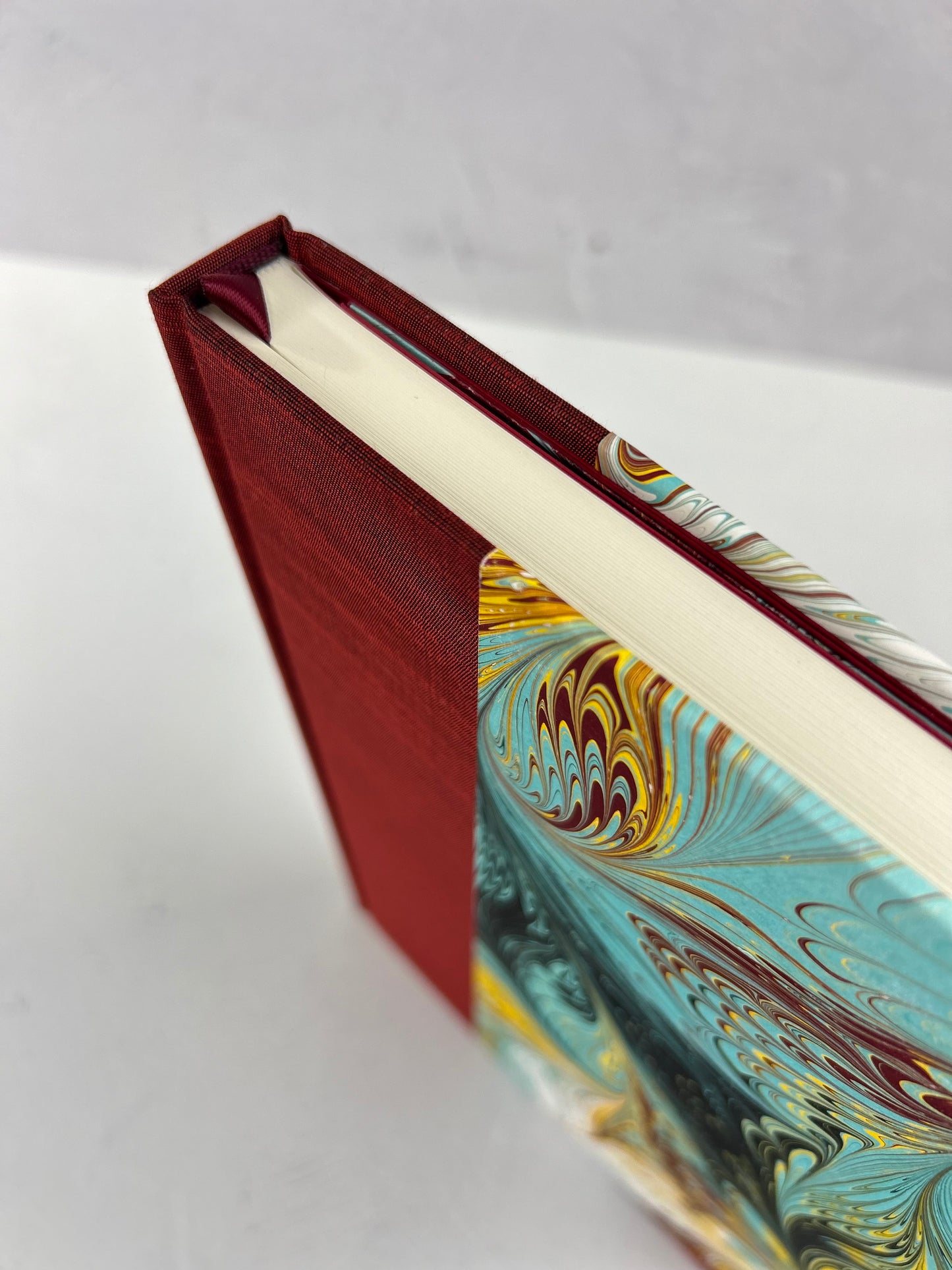 B5 192-page Hardcover Journal finished in Dark Red Japanese book cloth and hand marbled paper by Daniel Gaál