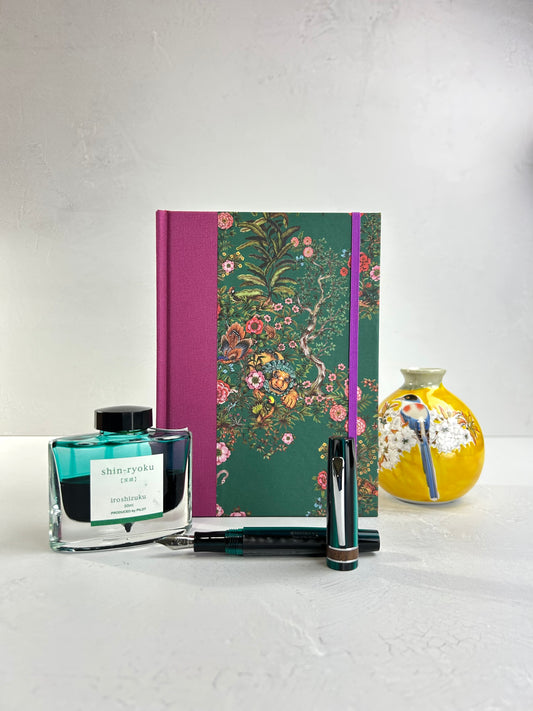 A5 160-page Hardcover Journal finished in in Berry Bloom Verona book cloth and Oasis Print by Phannapast Taychamaythakool
