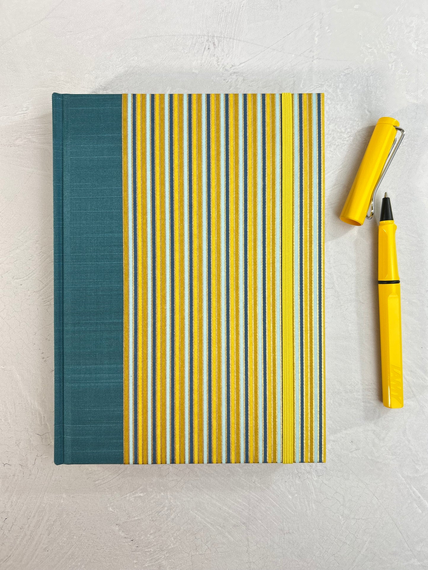 A5 160-page Hardcover Journal finished in Marine Blue Japanese book cloth and pinstripe Chiyogami Paper