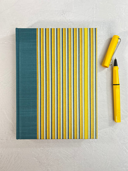 A5 160-page Hardcover Journal finished in Marine Blue Japanese book cloth and pinstripe Chiyogami Paper