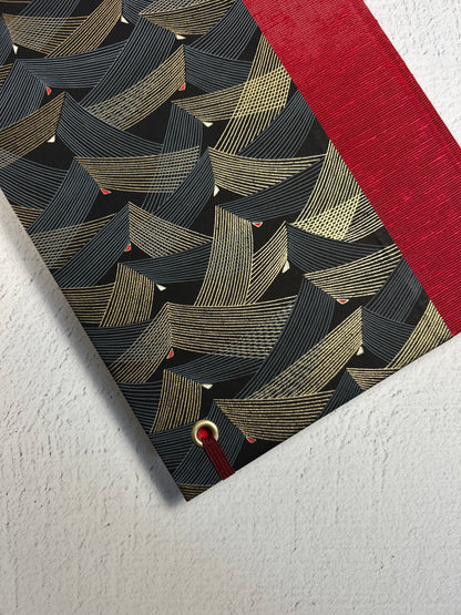 A5 160-page Hardcover Hardcover Notebook finished in Cardinal Red Japanese Bookcloth and Black and Gold Chiyogami Japanese Paper