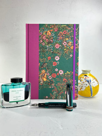 B5 192-page Hardcover Journal finished in Berry Bloom Verona book cloth and Oasis Print by Phannapast Taychamaythakool