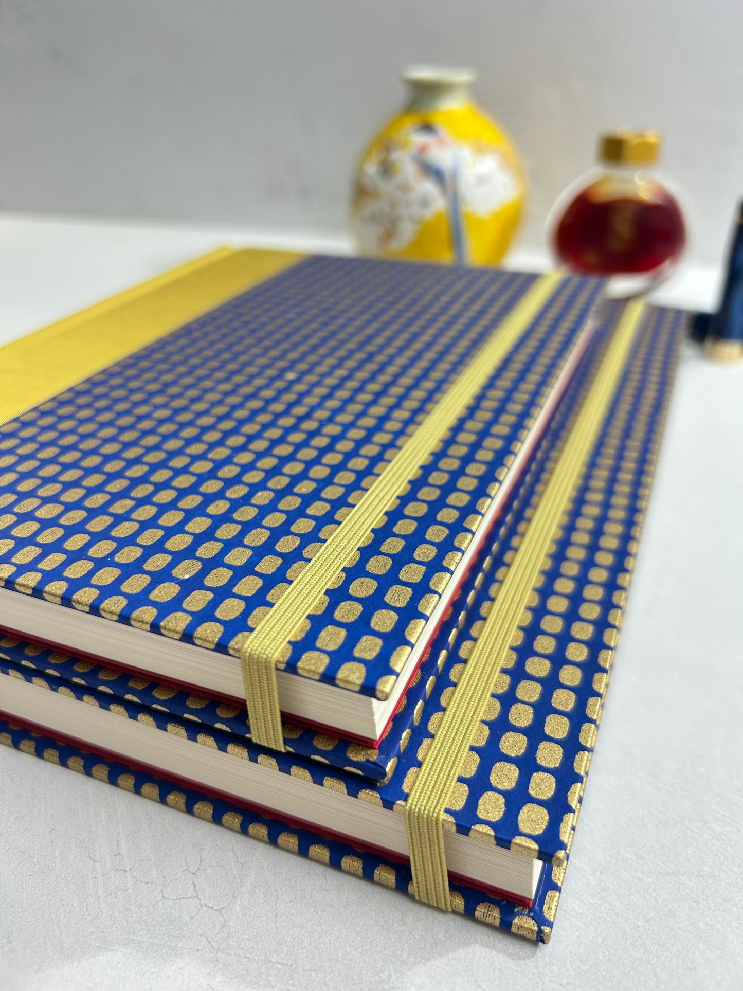 A5 160-page Hardcover Journal finished in Yellow Gold Japanese book cloth and blue and gold Chiyogami Paper
