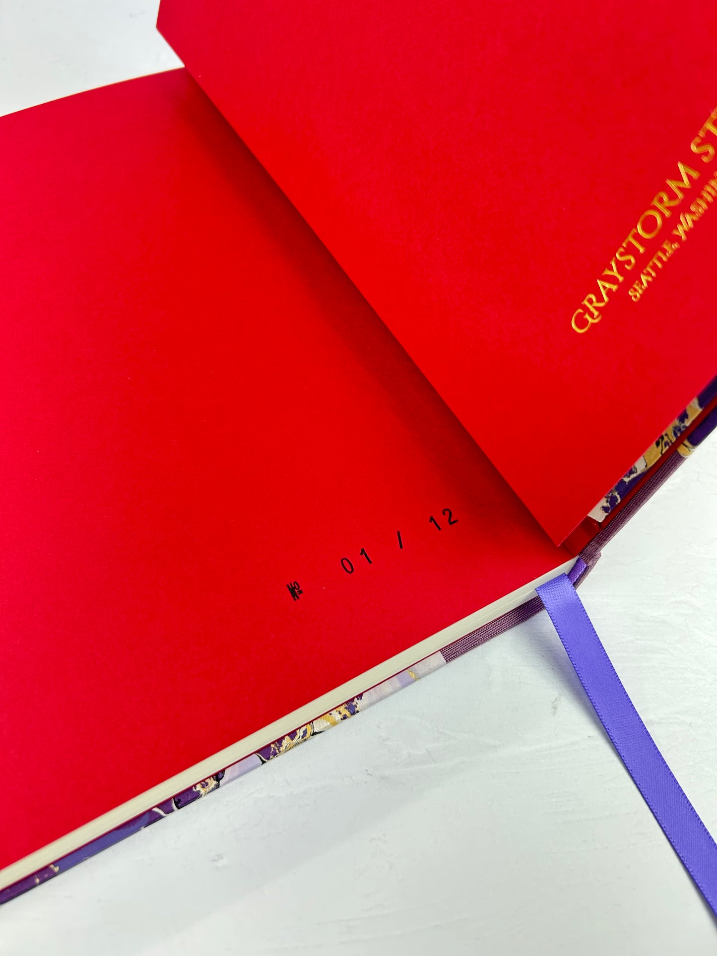 B5 192-page Hardcover Journal finished in plum Japanese book cloth and hand marbled paper by Renato Crepaldi