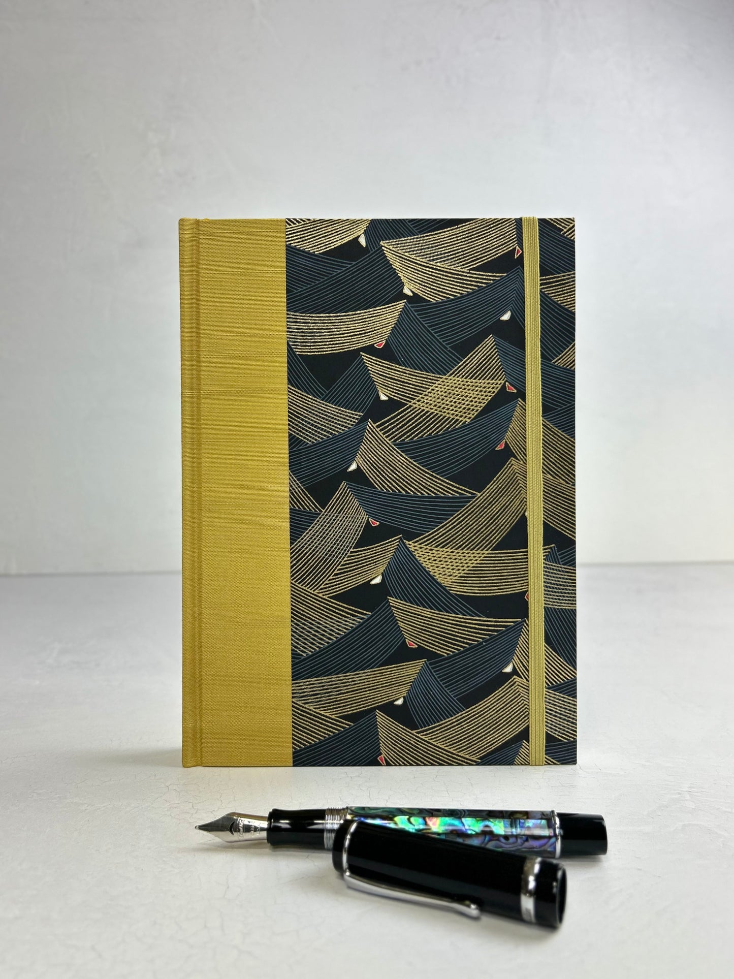 A5 160-page Hardcover Journal finished in Yellow Gold Japanese book cloth and Golden Peaks Chiyogami Decorative Paper