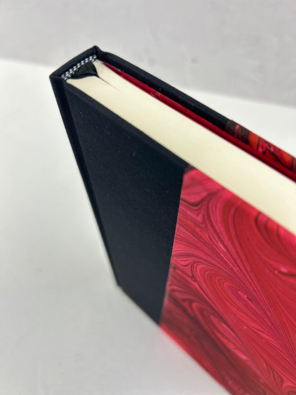 B5 192-page Hardcover Journal finished in Black Japanese book cloth and red hand marbled paper by Daniel Gaál