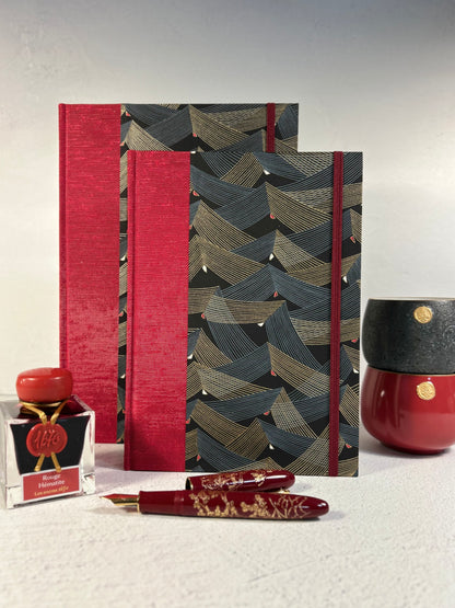 A5 160-page Hardcover Hardcover Notebook finished in Cardinal Red Japanese Bookcloth and Black and Gold Chiyogami Japanese Paper