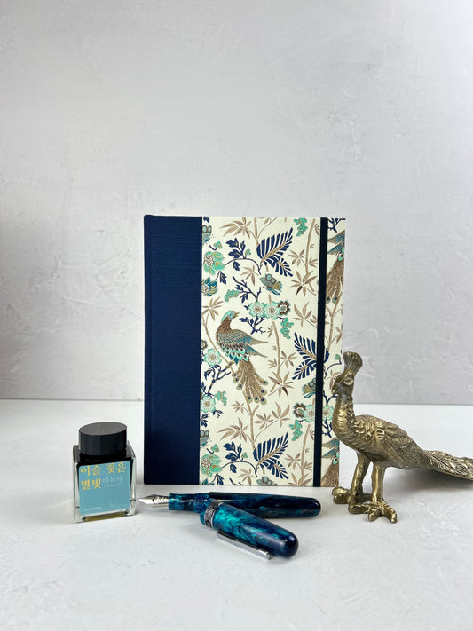 A5 Hardcover Notebook finished in Cadette Blue Japanese book cloth and Gold Peacock Italian Print