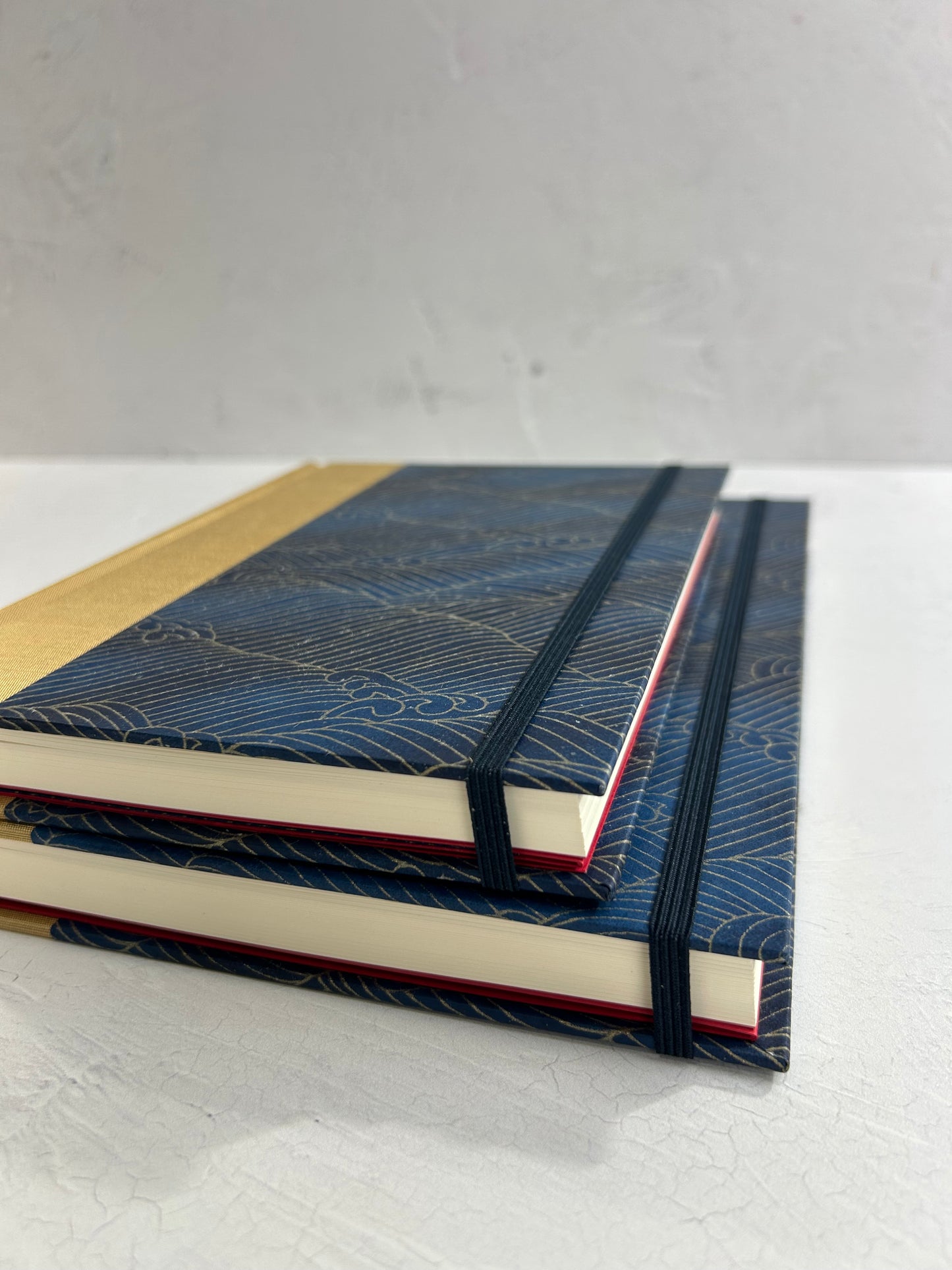 A5 160-page Hardcover Journal finished in soft gold Japanese book cloth and golden waves on blue Chiyogami Paper