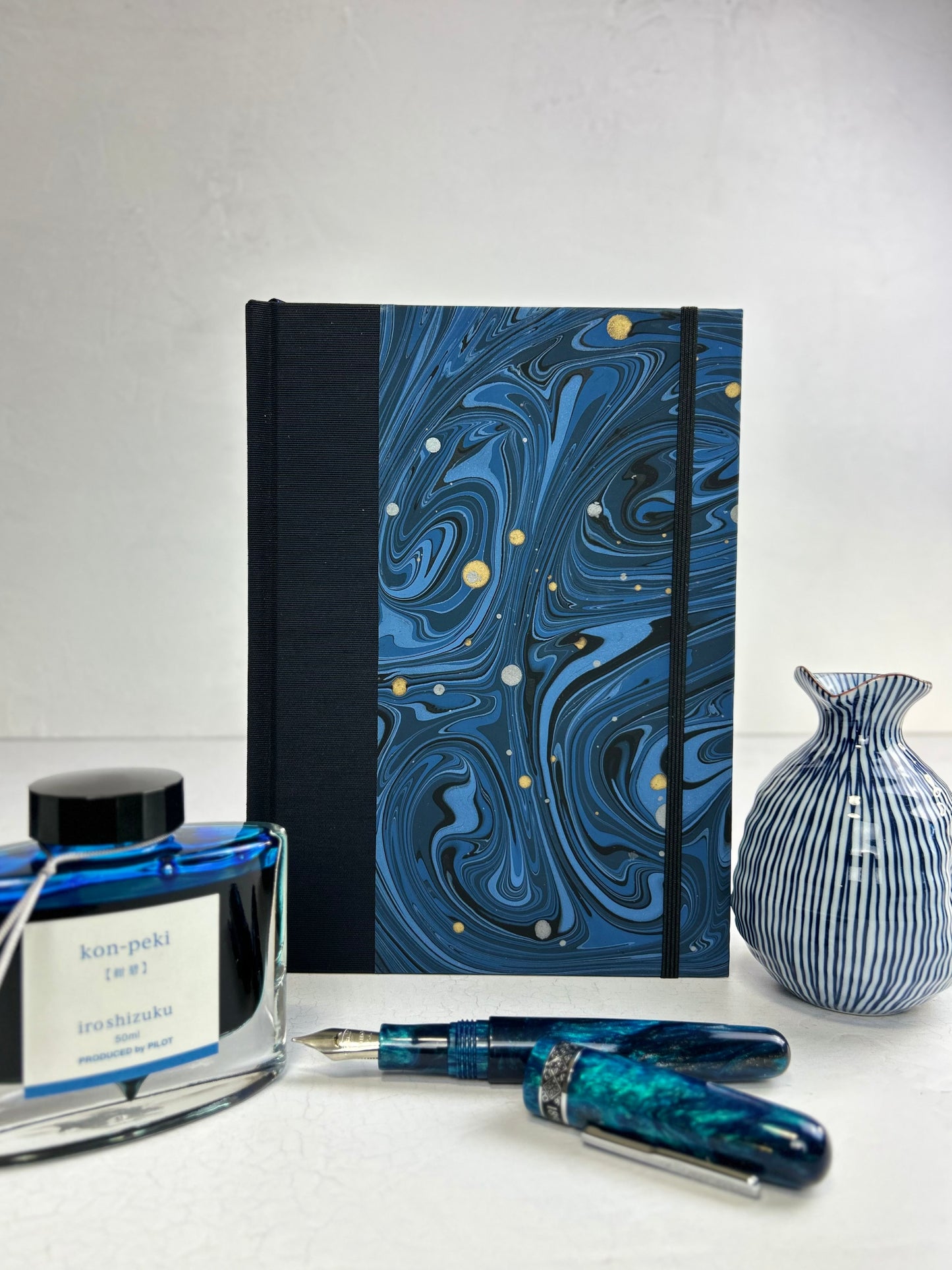 A5 160-page Hardcover Journal finished in Black Japanese book cloth and Renato Crepaldi hand marbled decorative paper