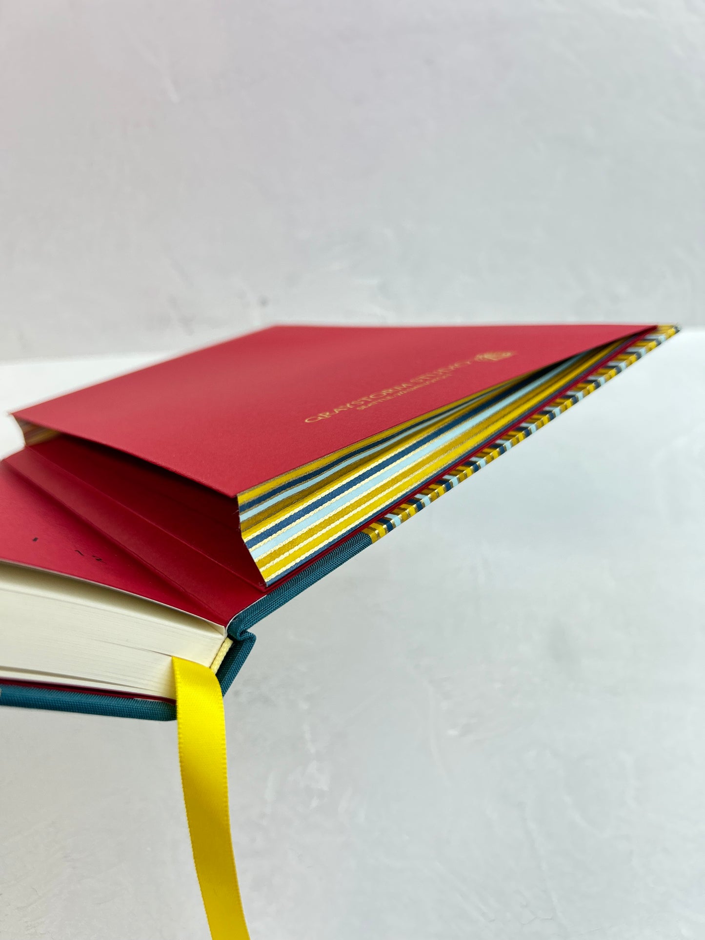 B5 192-page Hardcover Journal finished in Marine Blue Japanese book cloth and pinstripe Chiyogami Paper