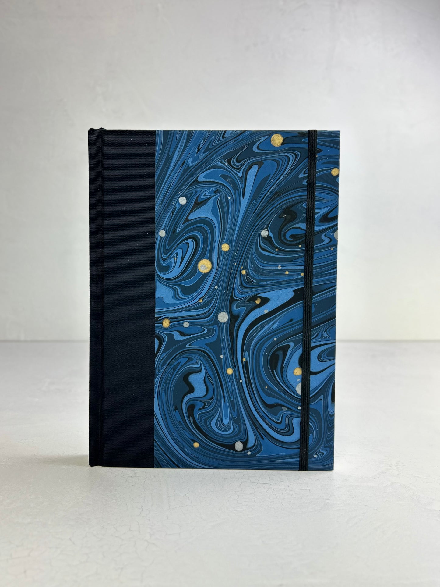 A5 160-page Hardcover Journal finished in Black Japanese book cloth and Renato Crepaldi hand marbled decorative paper