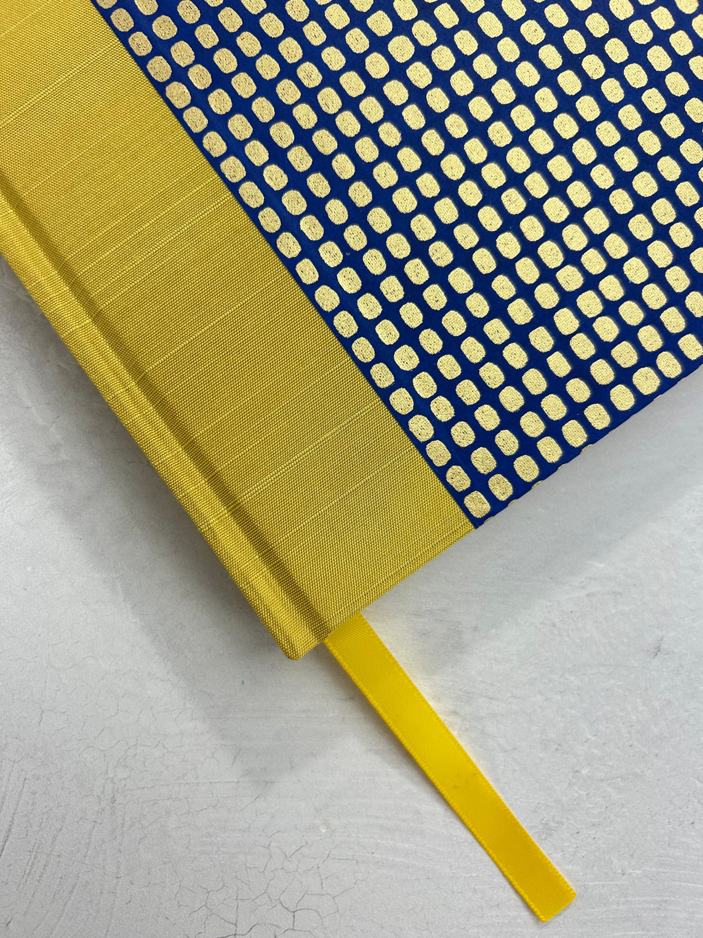 A5 160-page Hardcover Journal finished in Yellow Gold Japanese book cloth and blue and gold Chiyogami Paper