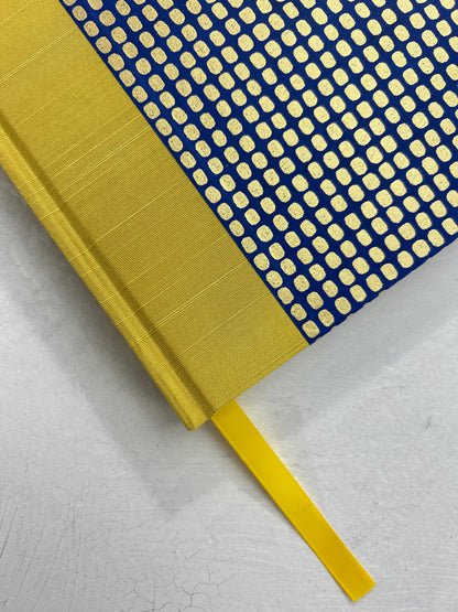 A5 160-page Hardcover Journal finished in Yellow Gold Japanese book cloth and blue and gold Chiyogami Paper