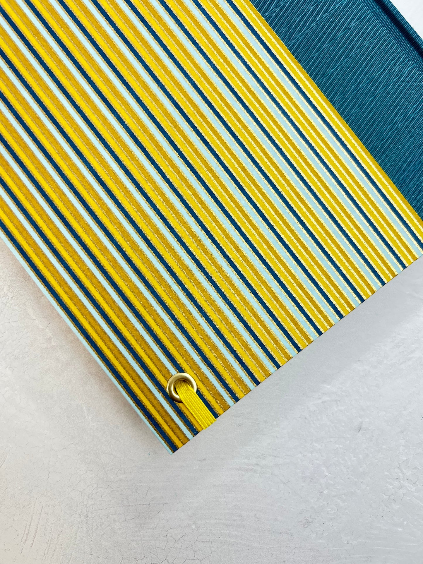 A5 160-page Hardcover Journal finished in Marine Blue Japanese book cloth and pinstripe Chiyogami Paper