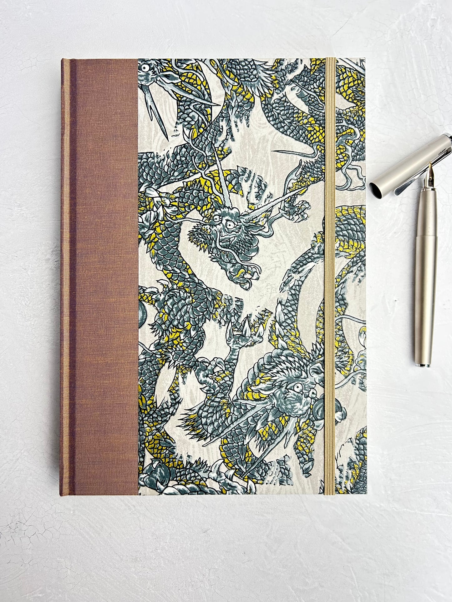 WABI-SABI B5 192-page Hardcover Journal finished in Bronze Japanese book cloth and Dragon Chiyogami Paper